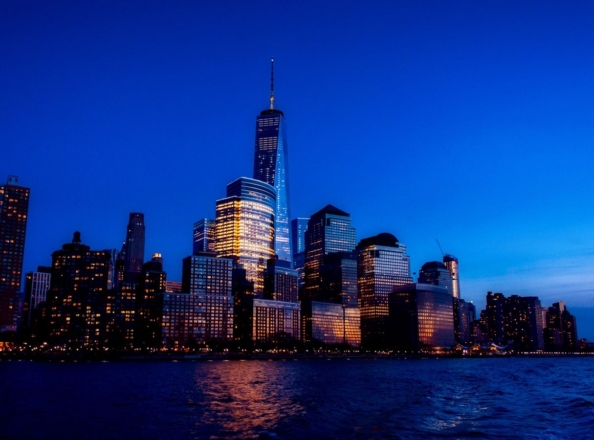City skyline across the water at dusk